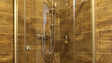 Shower, free toiletries, hair dryer, towels