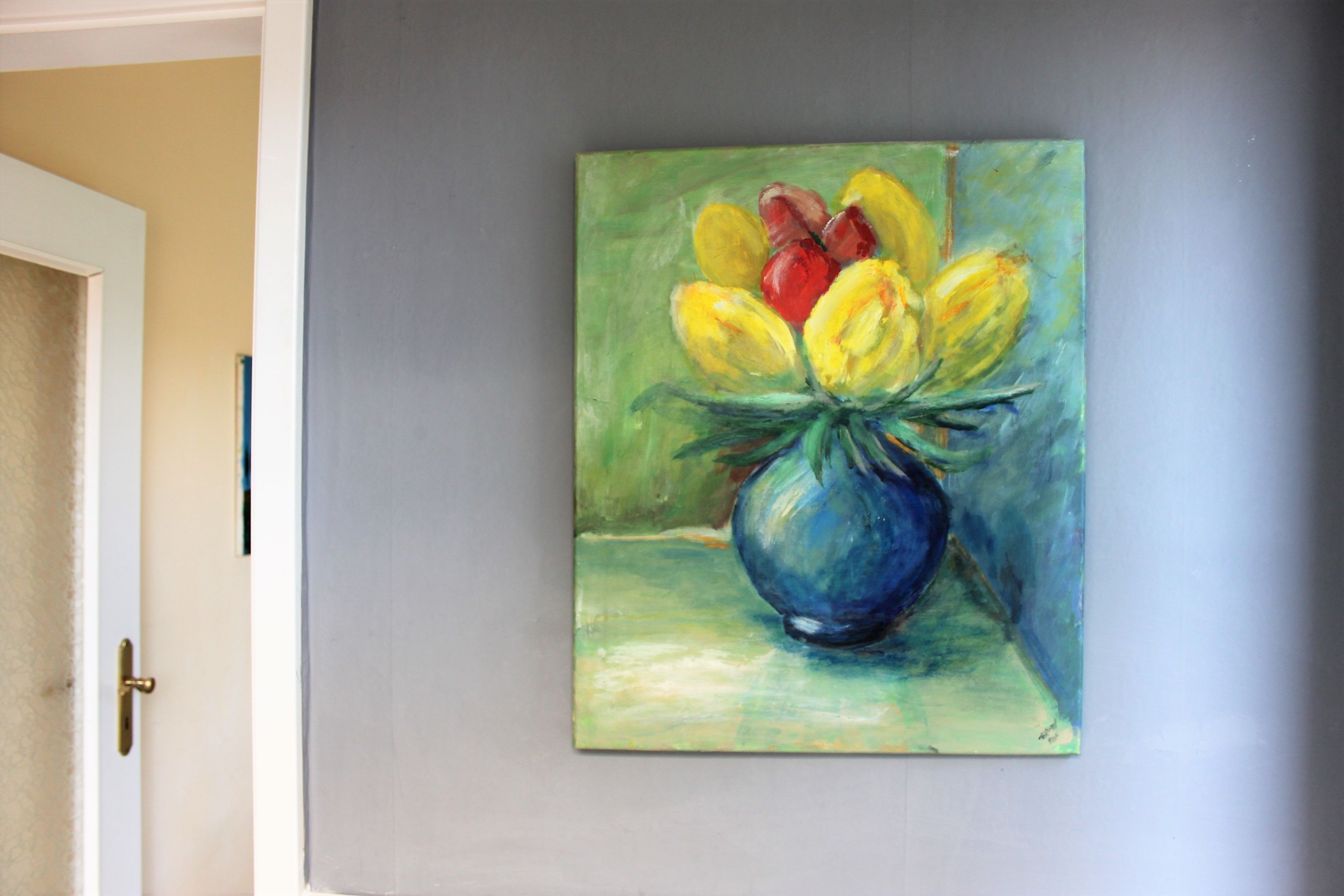 A painting of a vase with flowers on a wall.