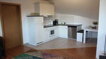 Apartment, 2 Bedrooms | Private kitchen | Fridge, oven, stovetop, dishwasher