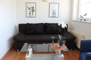 Apartment, 2 Bedrooms | Living area | Flat-screen TV - Ferienwohnung Orchidee (Lübbenau/Spreewald)