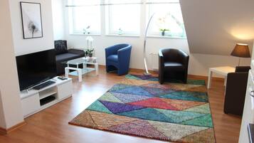 Apartment, 2 Bedrooms | Living area | Flat-screen TV