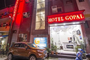 A hotel entrance with a reception desk and a sign that reads 'HOTEL GOPAL.' - Hotel Gopal (Haridwar)