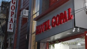 A hotel building with a sign reading 'HOTEL GOPAL' and multiple air conditioning units installed on the exterior. - Hotel Gopal (Haridwar)