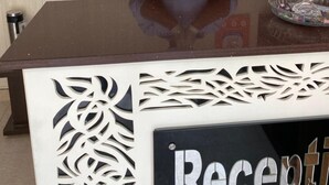 A hotel reception desk with a sign that reads 'Reception'. - Hotel Gopal (Haridwar)