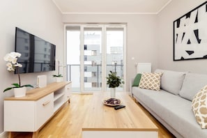 Superior-Apartment | Wohnzimmer | Flachbildfernseher