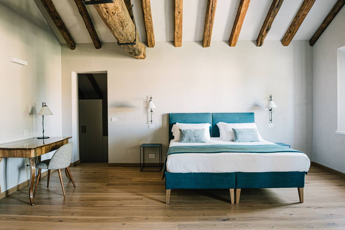 Suite, 2 camere da letto (Dimora) | Minibar, una cassaforte in camera, una scrivania, insonorizzazione