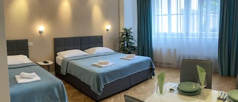 Studio Suite, 1 Bedroom | 1 bedroom, blackout curtains, iron/ironing board, free WiFi
