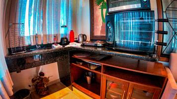 Cabana luxo | Cozinha privada | Micro-ondas, fogão, chaleira elétrica, liquidificador