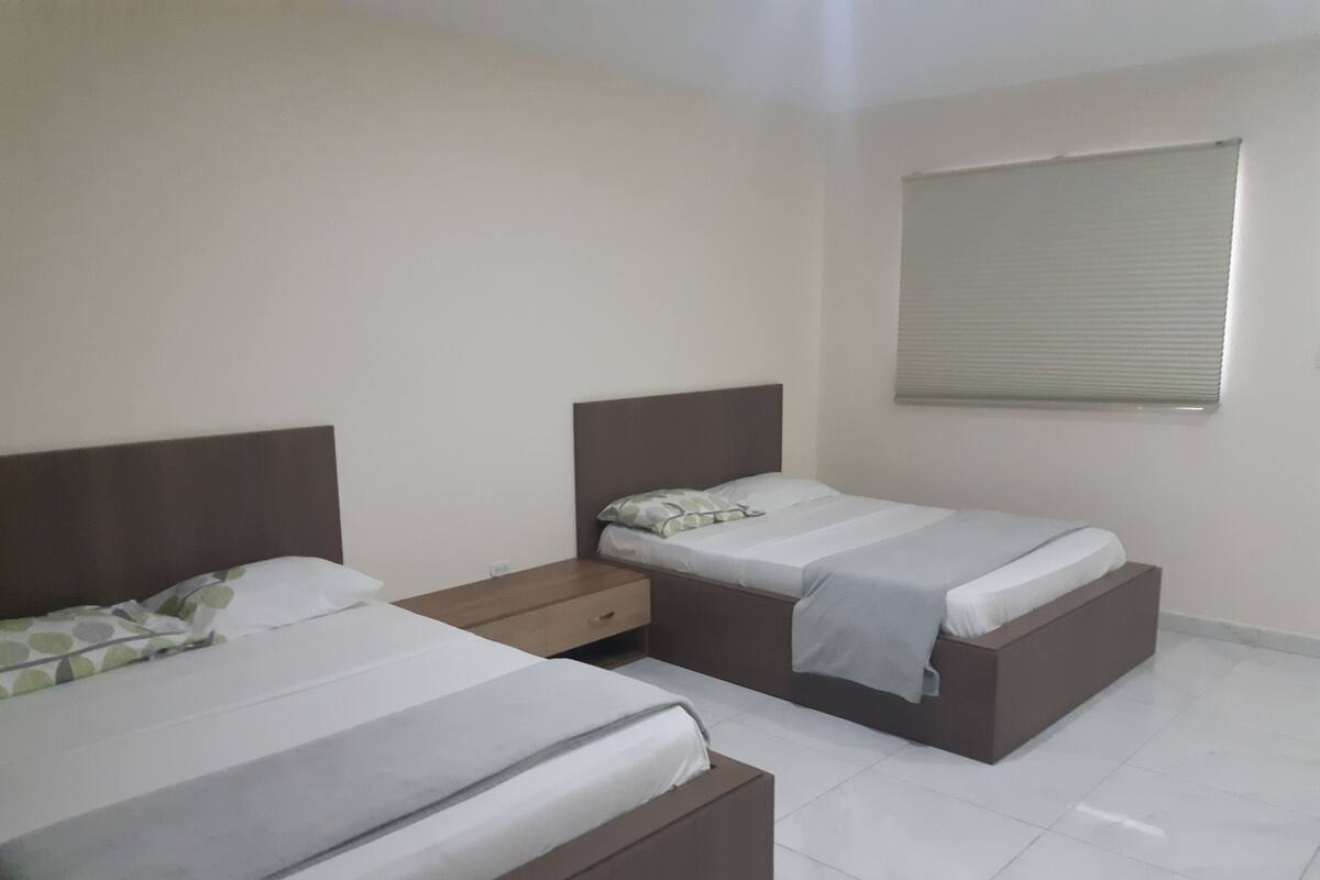 Deluxe Studio Suite, 2 Queen Beds | 2 bedrooms, desk, laptop workspace, free WiFi