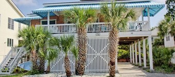 Four houses from the beach with a wrap around porch for relaxing