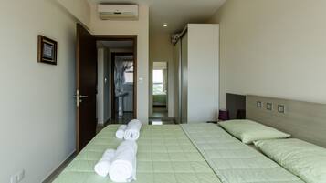Business Apartment | 1 bedroom, premium bedding, down comforters, individually decorated