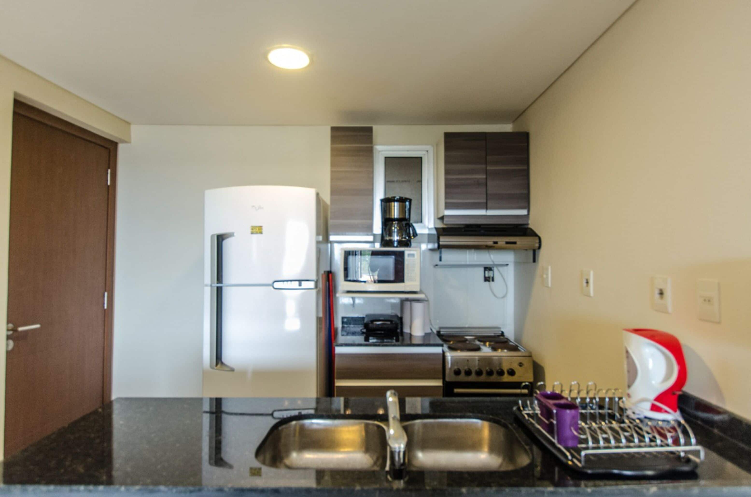 business apartment | private kitchenette | full-sized fridge, microwave, oven, stovetop