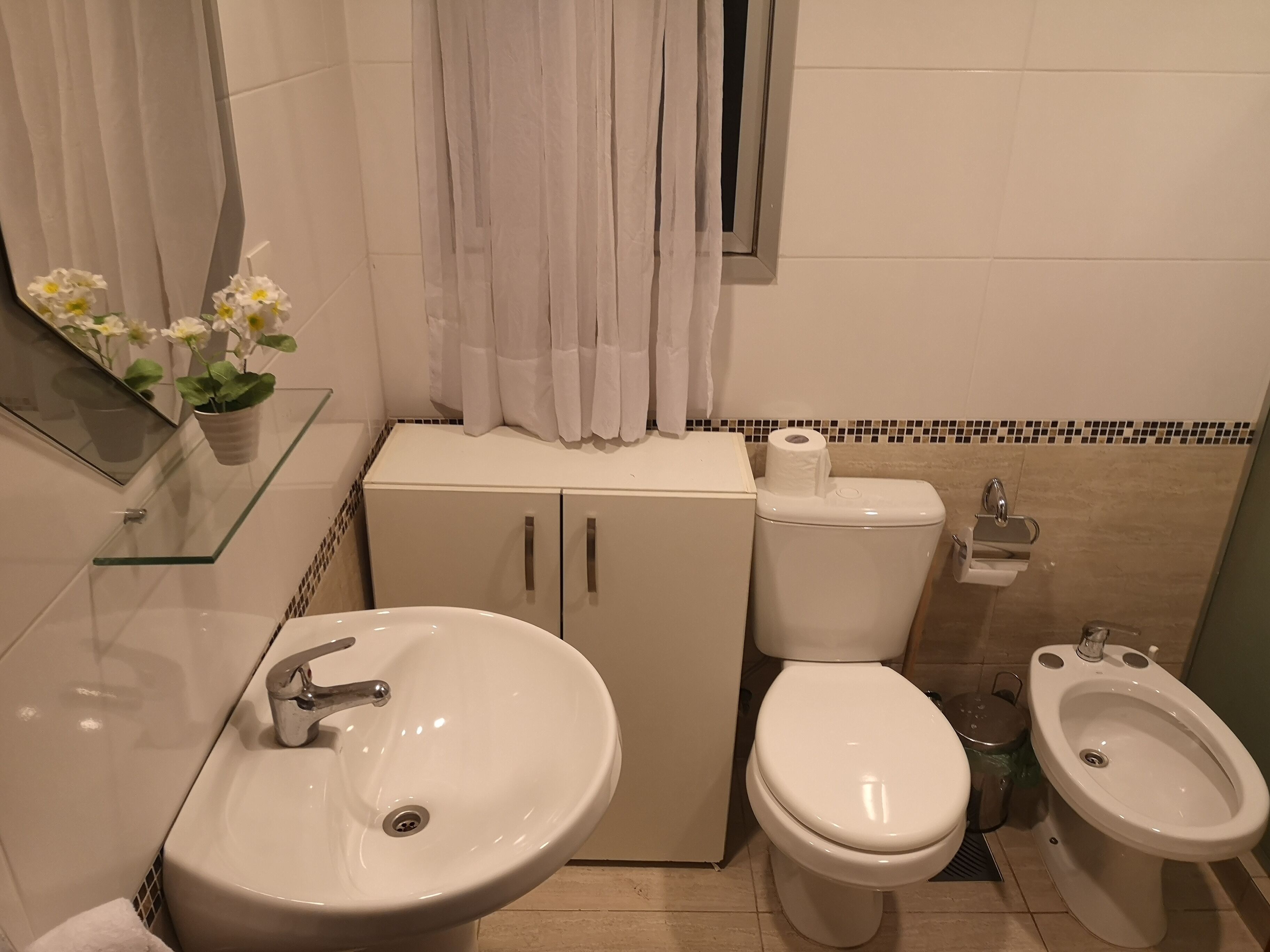 business apartment | bathroom | shower, rainfall showerhead, hair dryer, bidet