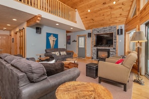 42-inch TV with cable channels, fireplace