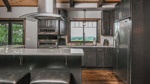 Maison, plusieurs lits, cheminée | Cuisine privée