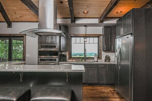 House, Multiple Beds, Fireplace | Private kitchen | Fridge, microwave, oven, stovetop