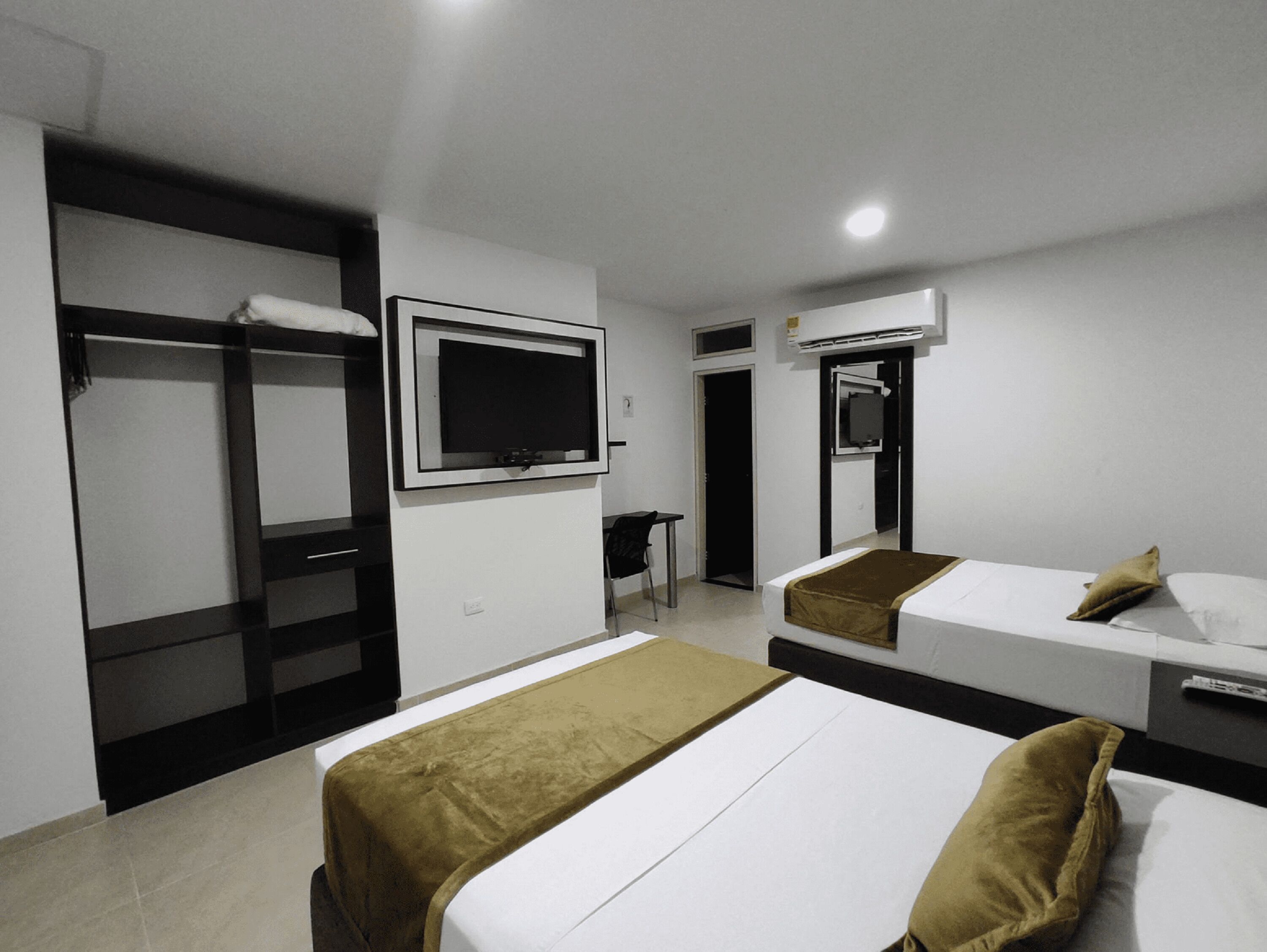 family room | minibar, in-room safe, desk, iron/ironing board