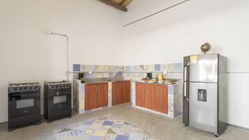 Fridge, microwave, cookware/dishes/utensils