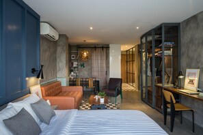 Desk, laptop workspace, blackout curtains, iron/ironing board - Pepper House Studio Apartment (Ho Chi Minh City)