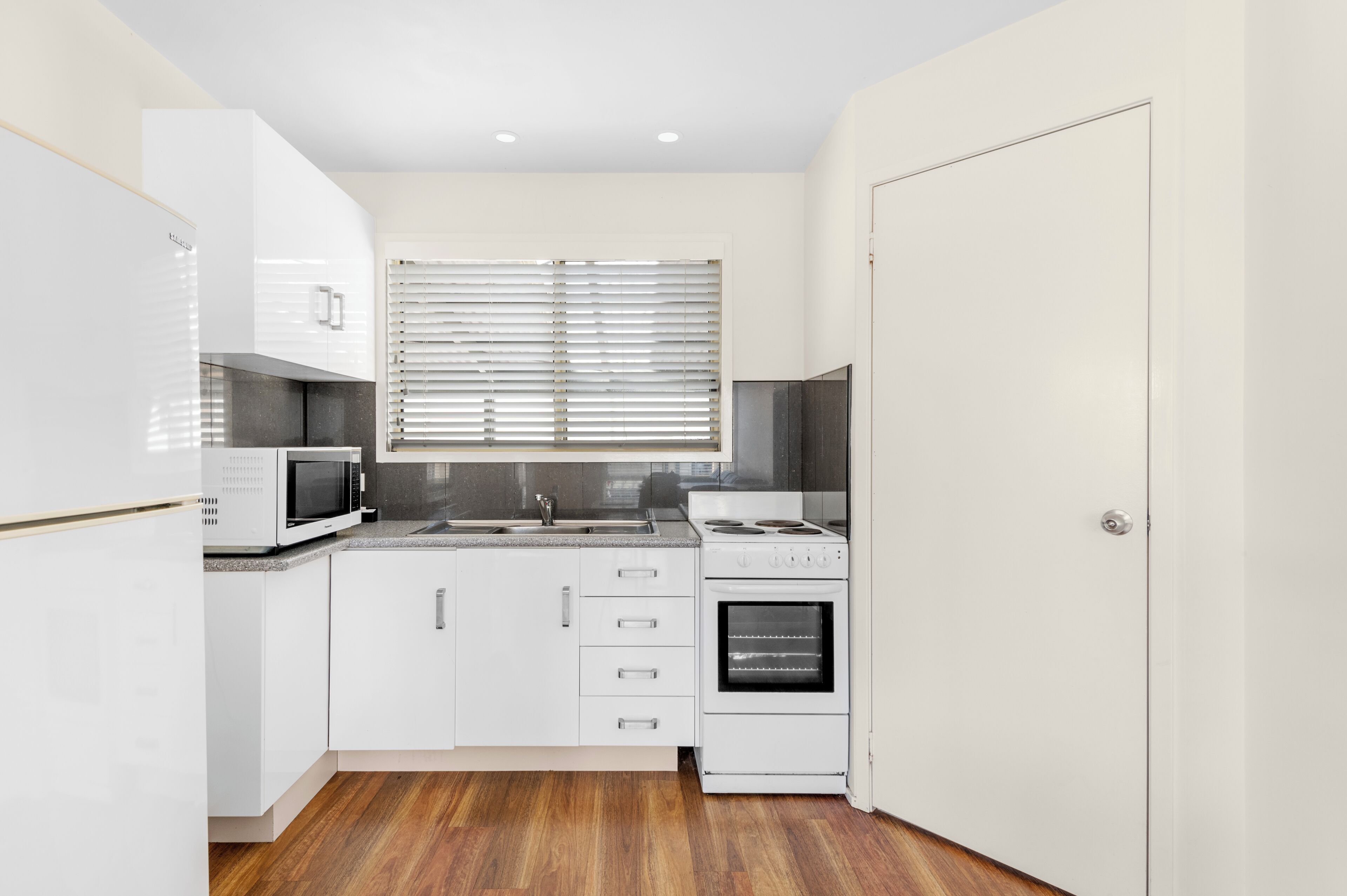 deluxe cabin | private kitchen | full-sized fridge, microwave, stovetop, toaster