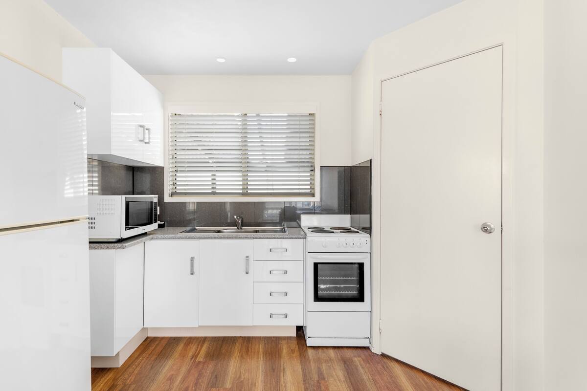 deluxe cabin | private kitchen | full-sized fridge, microwave, stovetop, toaster