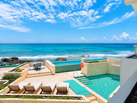 2 outdoor pools, open 8:00 AM to 8:00 PM, pool umbrellas, pool loungers. The Mint Resort Isla Mujeres