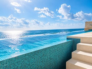 2 outdoor pools, open 8:00 AM to 8:00 PM, pool umbrellas, sun loungers