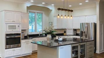 Fridge, microwave, coffee/tea maker, ice maker