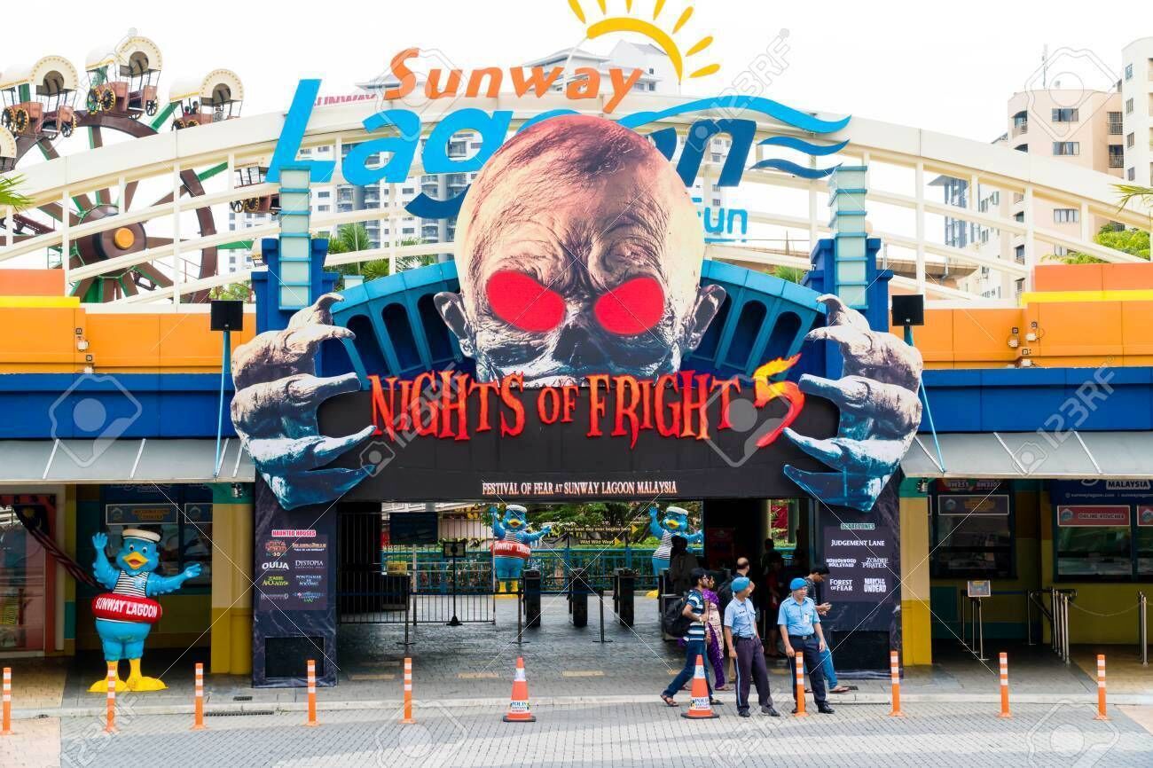A large entrance with a sign for Sunway Lagoon, featuring a prominent skull and crossbones design.
