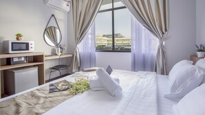 Apartemen | 1 kamar tidur, brankas, meja kerja, dan ruang kerja ramah laptop