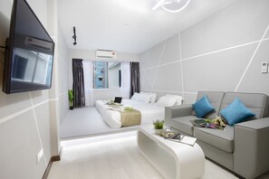 Futuristic Junior Suite | 1 bedroom, in-room safe, individually decorated, individually furnished