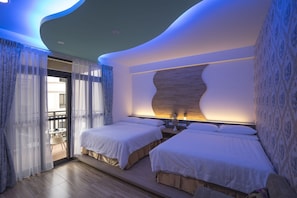 Family Quadruple Room, 1 Bedroom | Memory foam beds, desk, blackout drapes, soundproofing - Starry Night Laurel Hotel (Magong)