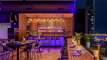 3 bars/lounges, rooftop bar
