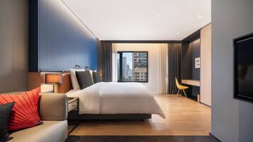 Premium bedding, down duvets, in-room safe, desk