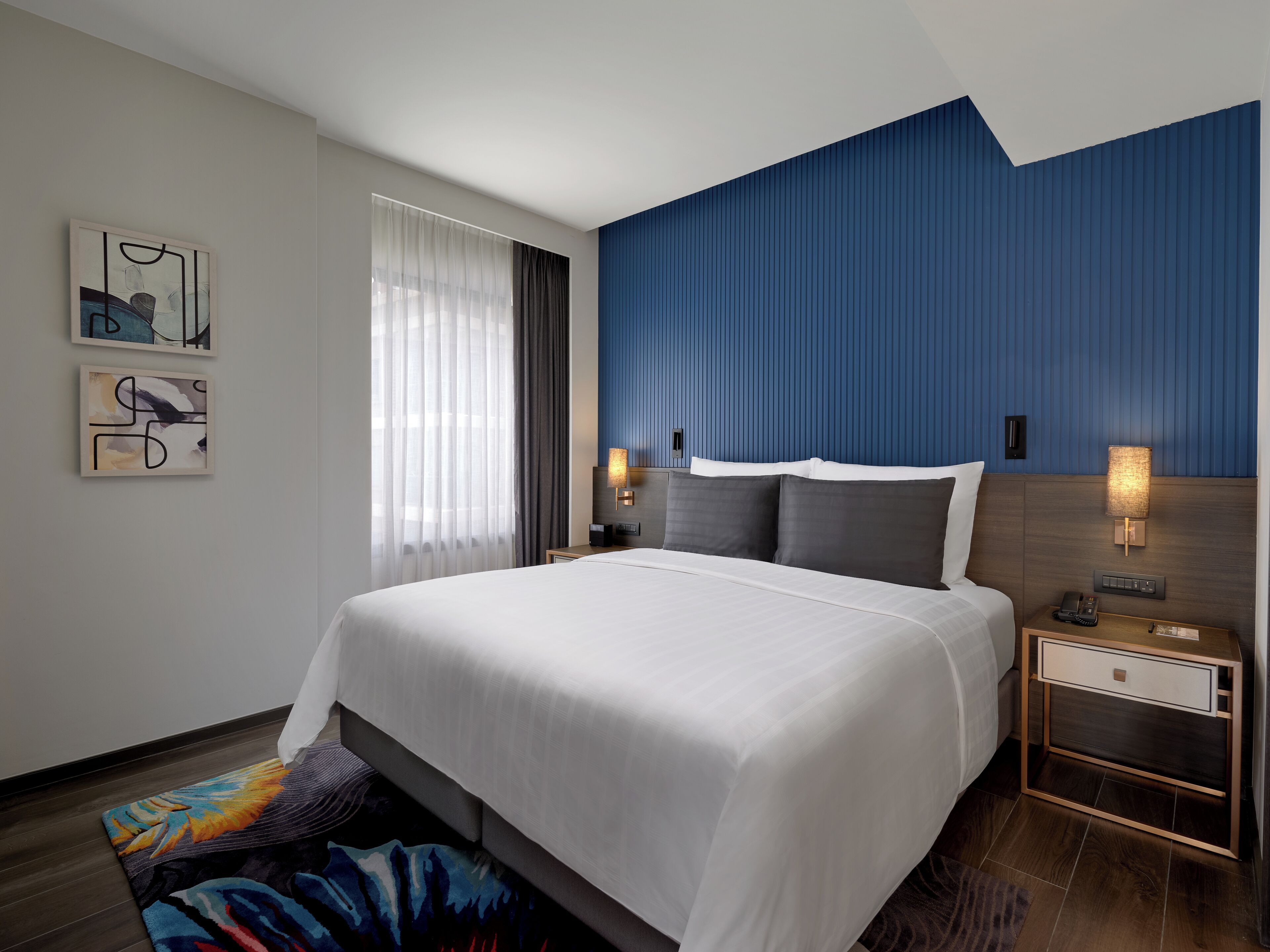 Premium bedding, down duvets, in-room safe, desk