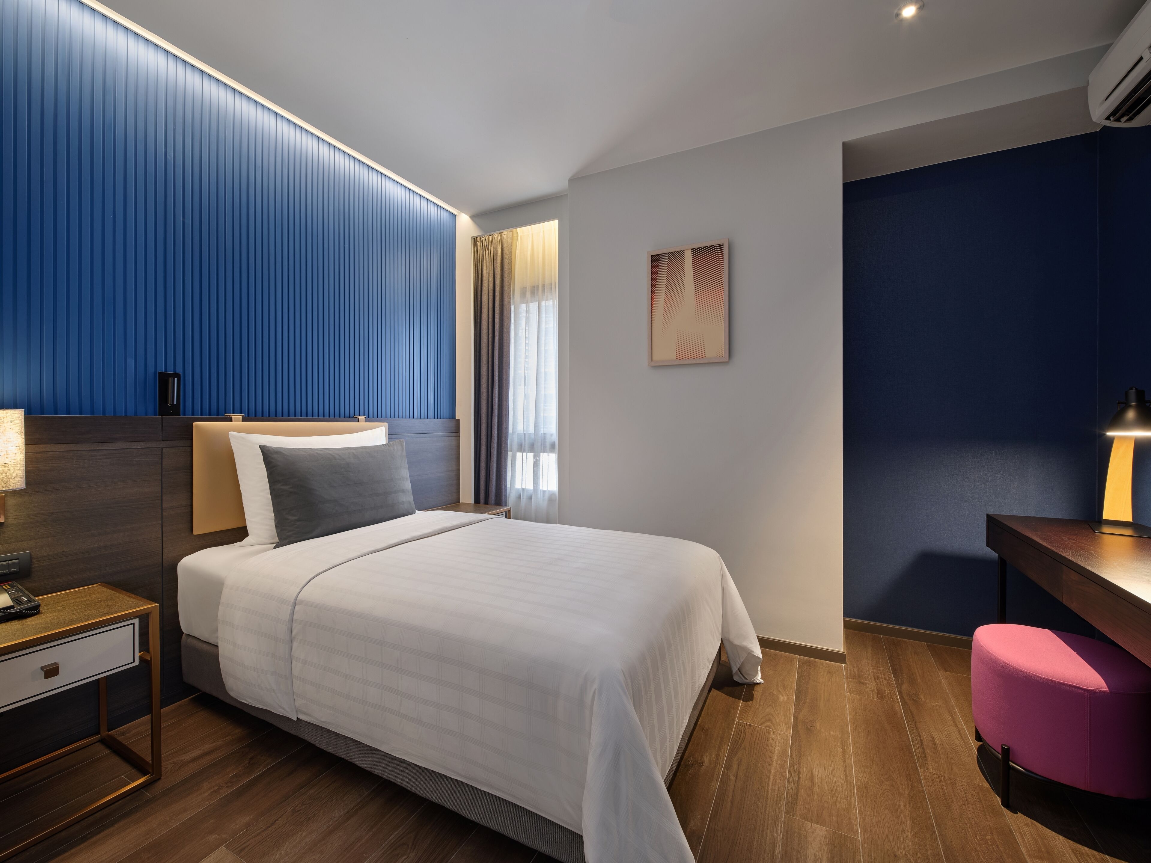 Premium bedding, down duvets, in-room safe, desk