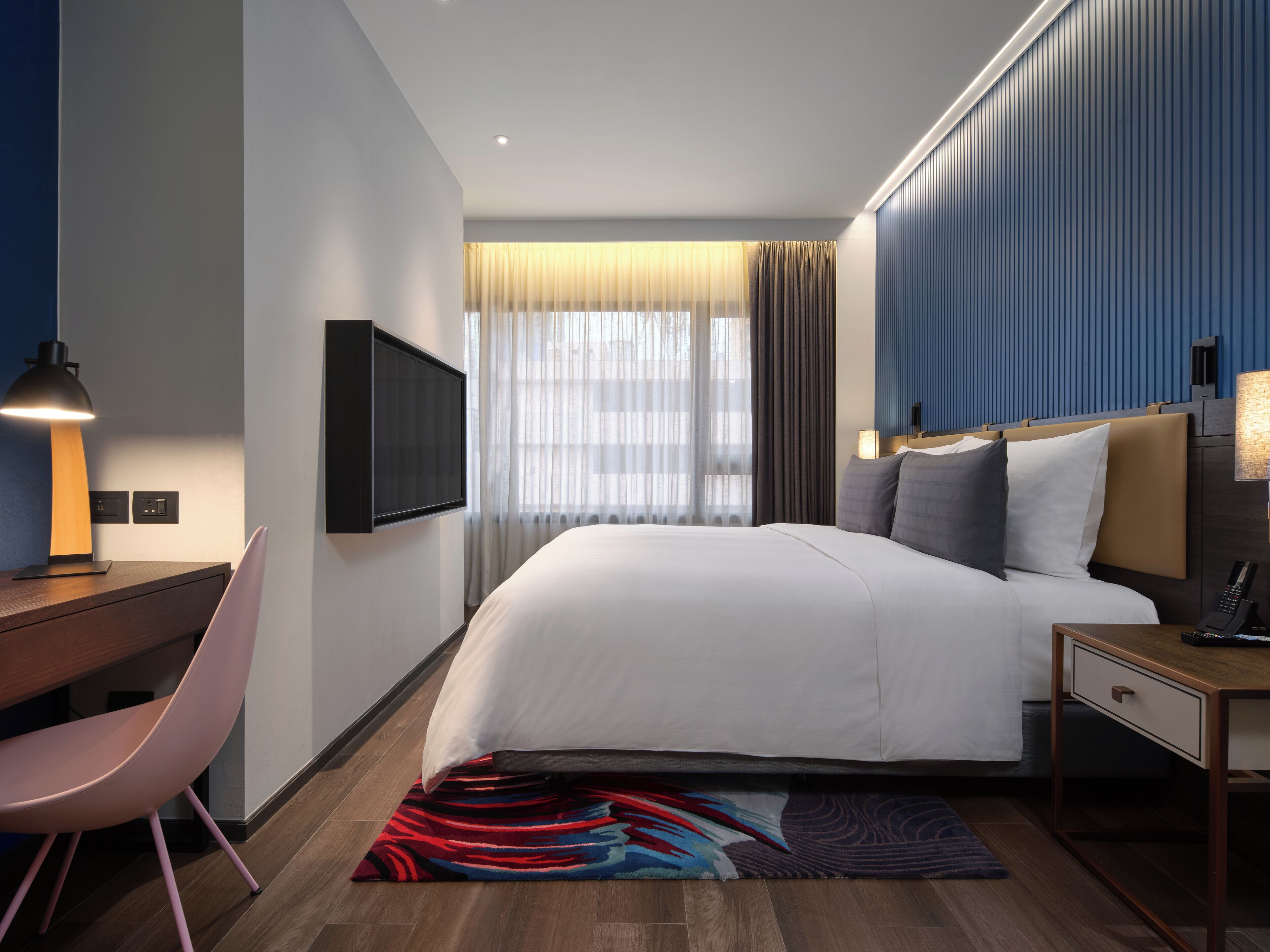 Premium bedding, down duvets, in-room safe, desk