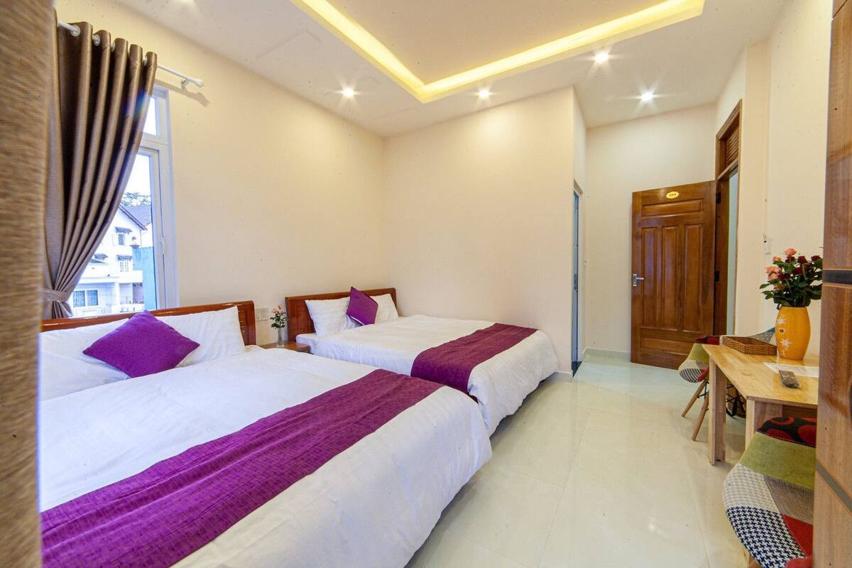Quadruple Room | Individually furnished, blackout drapes, iron/ironing board, free WiFi
