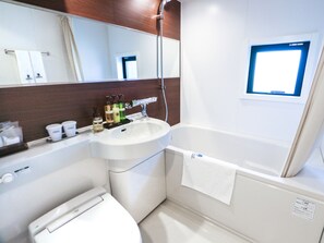 Bañera con ducha, artículos de tocador gratuitos, secador de pelo