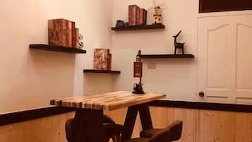 Family Quadruple Room | Living area | Flat-screen TV