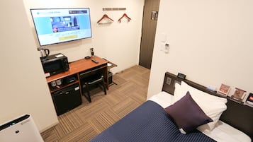 Desk, blackout curtains, free WiFi, bed sheets