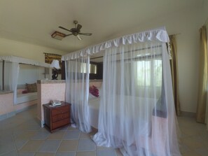 Deluxe Room | Minibar, in-room safe, desk, laptop workspace - The Vagabond Lodge (Mkwaja)