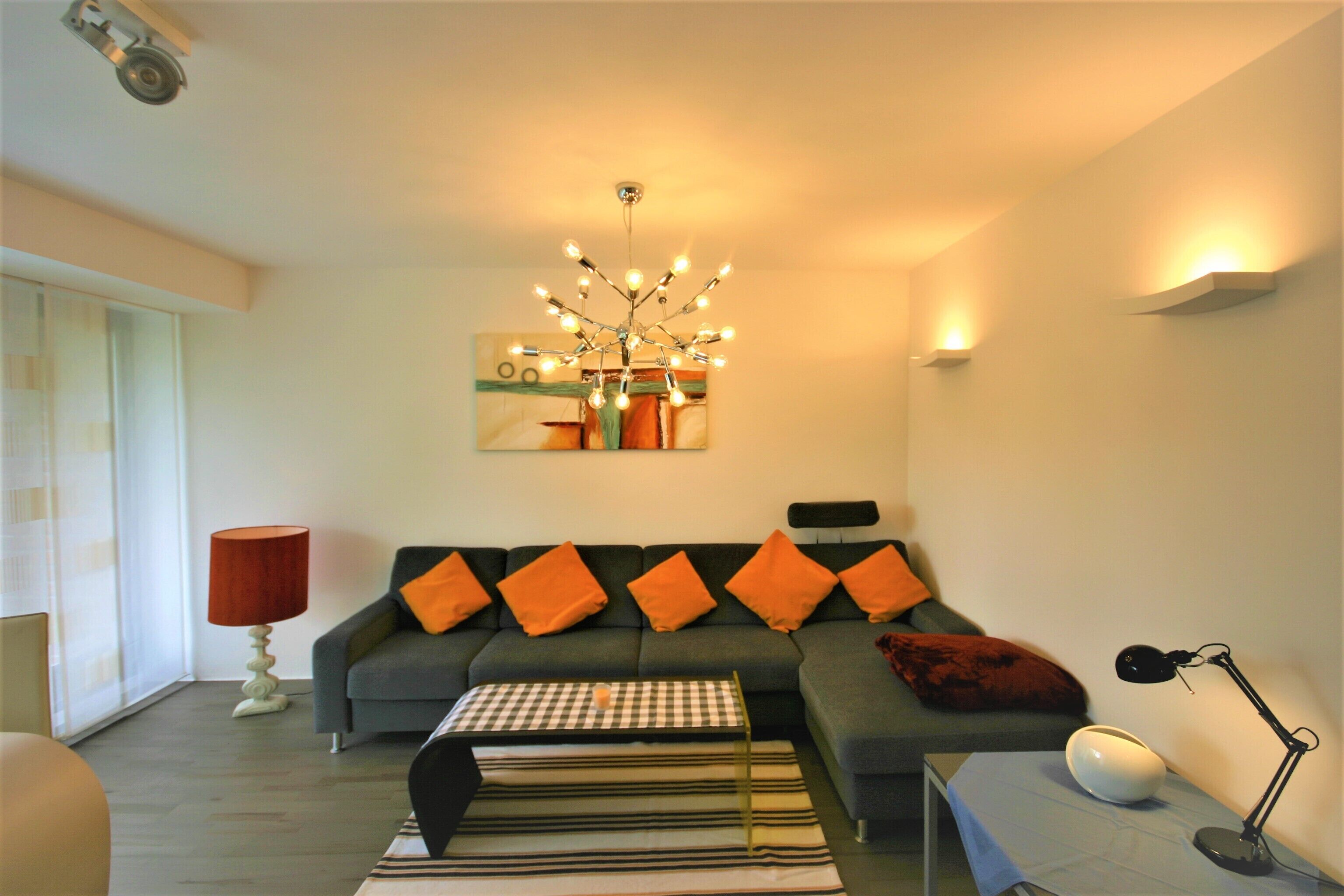 Family Apartment | Living area | 40-inch flat-screen TV with satellite channels, TV, Netflix