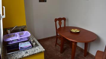 Desk, laptop workspace, blackout curtains, iron/ironing board