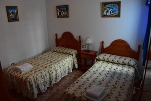 Desk, laptop workspace, blackout curtains, iron/ironing board