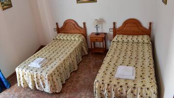 Desk, laptop workspace, blackout curtains, iron/ironing board