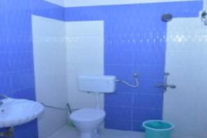 Standard Room | Bathroom | Shower, towels - Hotel Goverdhan Tourist Complex (Kiraoli)