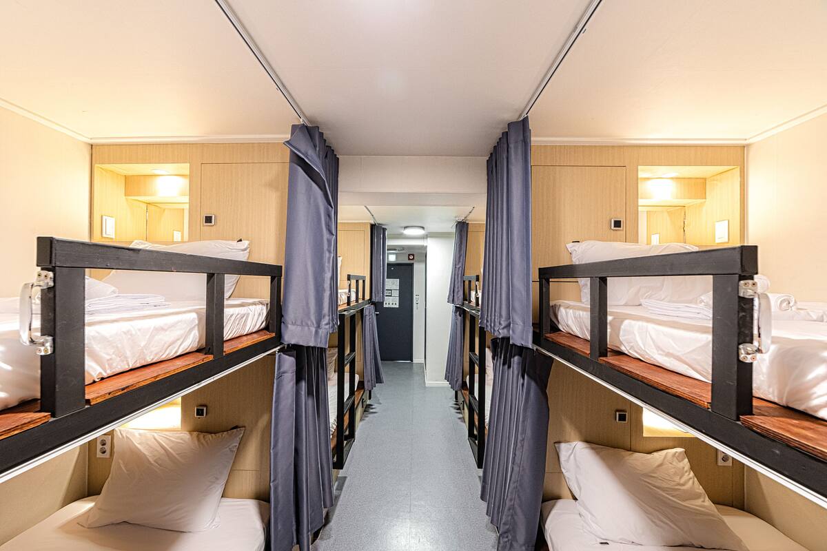 Dormitorio condiviso Deluxe, dormitorio misto (8 Beds) | Insonorizzazione, Wi-Fi gratuito, lenzuola