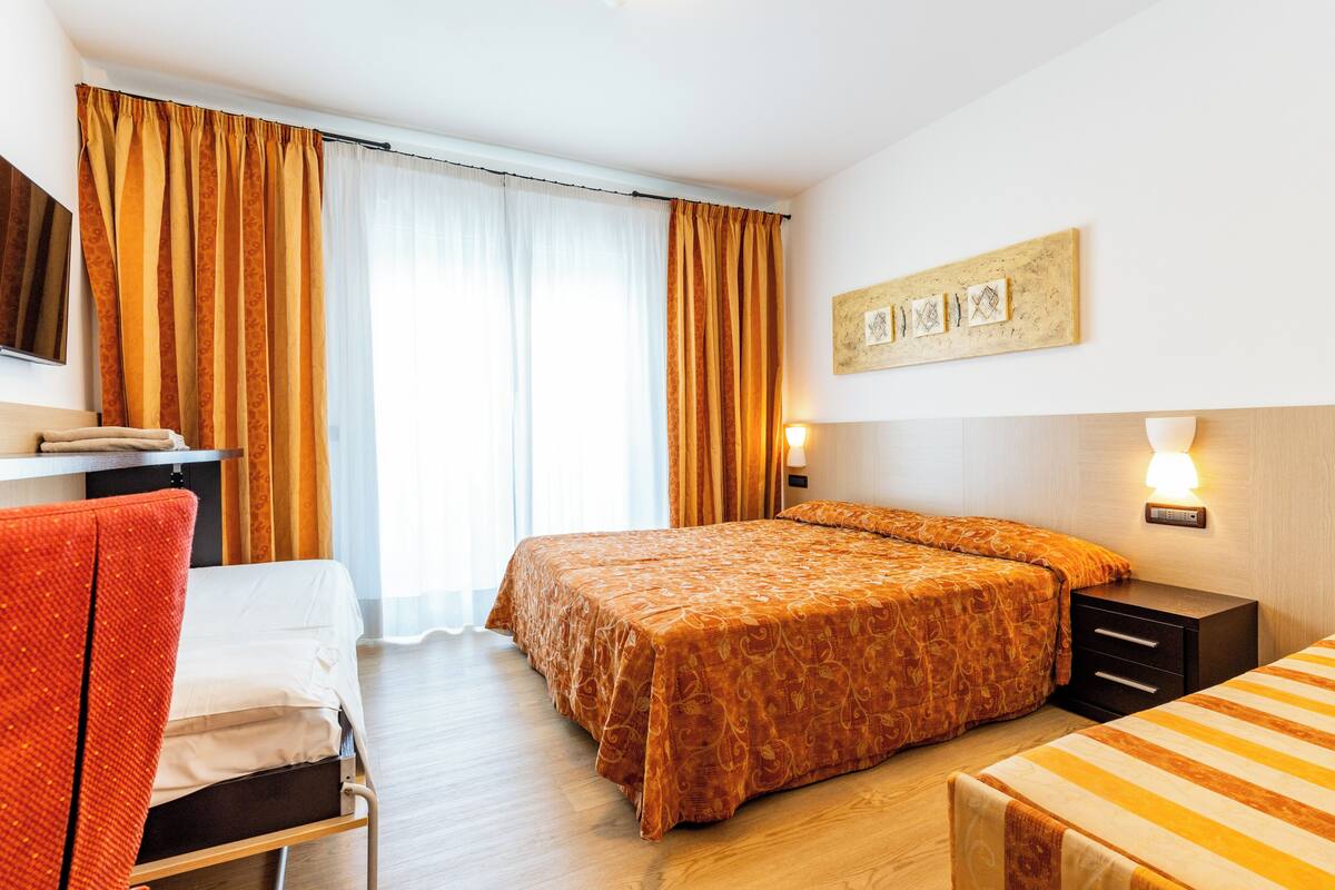 Standard Triple Room | In-room safe, desk, cribs (free), WiFi (free)
