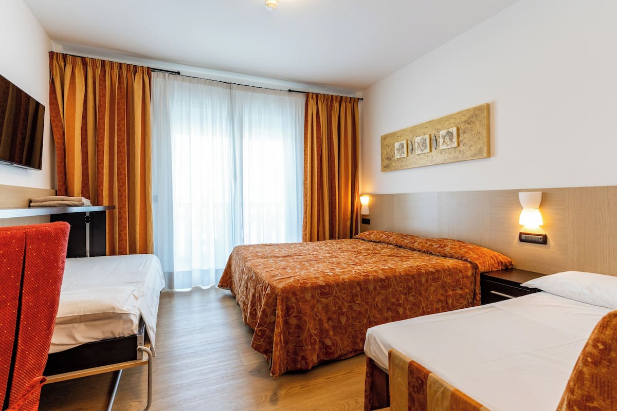 Family Room (2 Adults + 2 Children) | In-room safe, desk, cribs (free), WiFi (free)